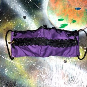 Purple and black “Zip the lips” face mask